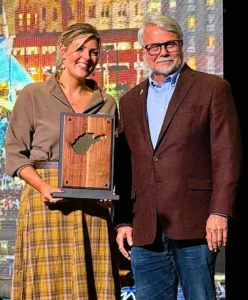 Lewis receives lifetime achievement award at tourism meet